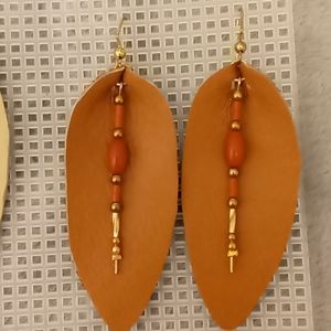 Teardrop earrings with Coral stones.